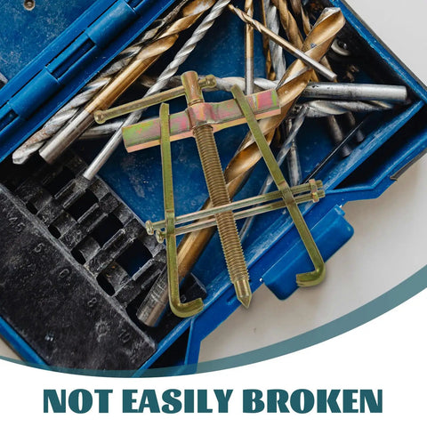 Heavy Duty Carbon Steel Two Jaw Gear Bearing Puller With Reinforced Grips in a toolbox with drill bits and tools.