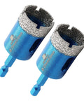 Two blue BRSCHNITT 25mm diamond core drill bits with 1-inch hex shanks for dry drilling porcelain ceramic stone.