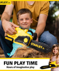 Child playing with a Kids Battery Powered Deluxe Chainsaw Toy For Role Play Realistic Actions And Sounds With Safe Durable Build.