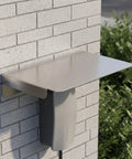 Heavy Duty Stainless Steel EV Charger Raincover Weather Resistant Charging Station Hood mounted over charging station on wall.