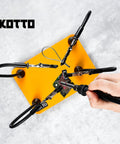 Third Hand Soldering Tool With Four Magnetic Gooseneck Arms And Stainless Clips For PCB Holder Soldering Repairs Jewelry And Crafts 360 Degree Rotation Non Slip Weighted Base Handy Helping Hands Station, shown securing a circuit board with a soldering iron in use.