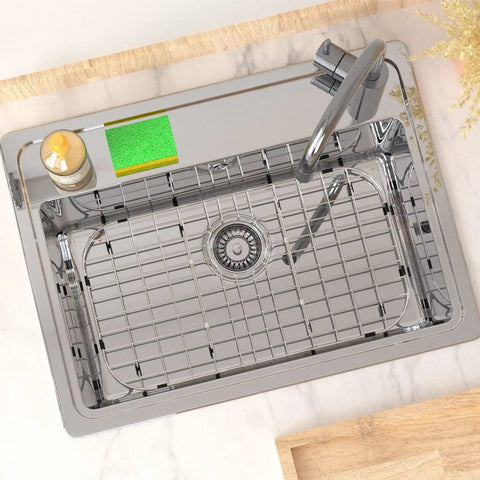 Top view of Sturdy Stainless Steel Sink Grid Protector 26 By 14 Inches For Kitchen Single Bowl With Rear Drain Hole And Three And A Half Inch Corner Radius Rust Resistant 304 Grade Metal Bottom Rack in a sink.
