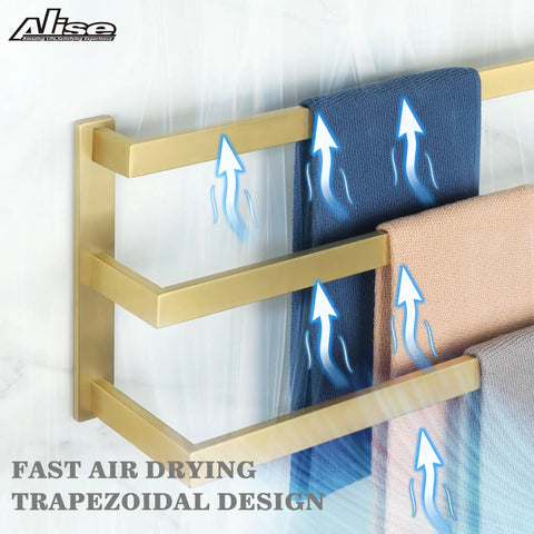 Gold three-tier towel bar with fast air drying trapezoidal design holding towels and arrows indicating airflow.
