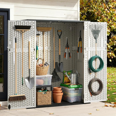 61 Cu Ft Outdoor Storage Shed With 56 Inch Wide Design, Waterproof Resin Cabinet With Floor, shown with tools and garden gear.