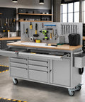 Heavy Duty Rolling Tool Chest With Ball Bearing Slides And Rock Solid Steel Workbench Storage Rack on wheels with tools on a pegboard.