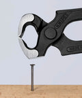 Carpenter's End Cutting Pliers For Heavy Duty Precision Work With Extreme Wear Resistance And Great Balance Plastic Coated Handles For Comfort And A Striking Face For Driving Nails Multicolor Hand Tool shown cutting a nail.