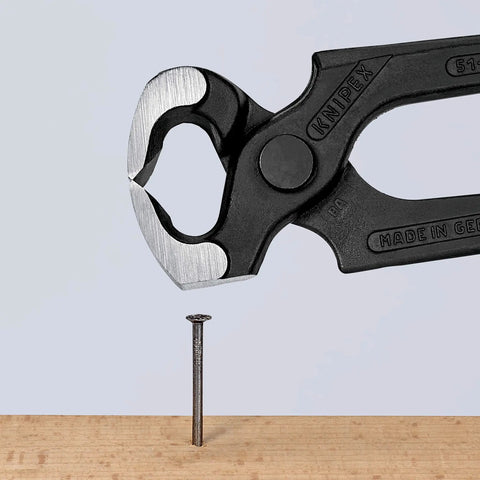 Carpenter's End Cutting Pliers For Heavy Duty Precision Work With Extreme Wear Resistance And Great Balance Plastic Coated Handles For Comfort And A Striking Face For Driving Nails Multicolor Hand Tool shown cutting a nail.
