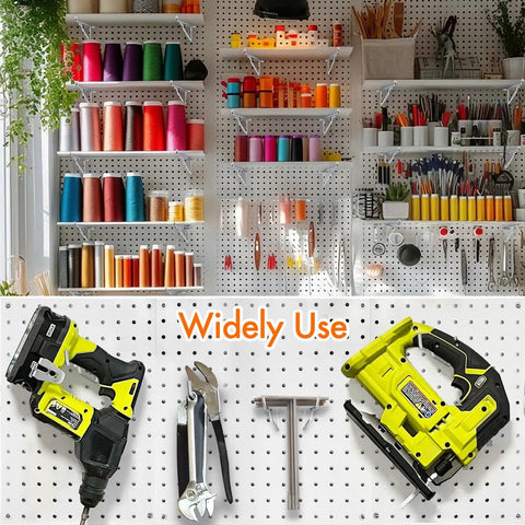 Craft room wall with pegboards and Heavy Duty Pegboard Hooks Kit Ten Pack Eight Inch Silver Pegboard Brackets organizing tools.