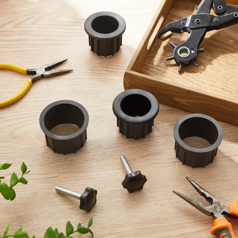Six Piece Patio Umbrella Base Ring Cover And Cap Kit With M8 Thread Hand Knob Caps Replacement Parts For Patio Umbrella Stands Black Plastic Knobs And Ring Covers 1.95 Inch And 1.55 Inch Sizes on a wooden table