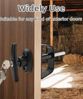 All In One Shed Door Latch Kit With T Handle Lock And Five Keys installed on wooden barn door with visible spring latch
