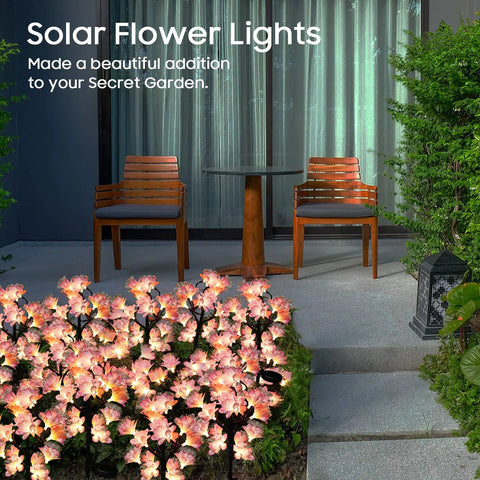 4 Pack Solar Flower Lights For Outdoors Waterproof Garden Decor That Look Real By Day And Glow Bright At Night in patio setting