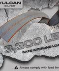 Ultimate Axle Tie Down Kit With Silver Series Webbing on cracked concrete, showing 3,300 lb safe working load warning.