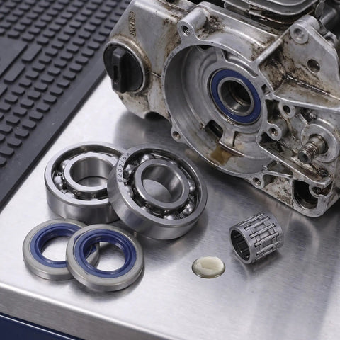 Chainsaw Crankshaft Bearing And Rubber Oil Seal Set For High Speed Transmission, Needle Roller Bearing Kit, Saw Repair For Gasoline Power Saws, Heavy Duty Pro Grade Sealing System For Tight Seal And Leak Free Performance, bearings and seals on metal bench