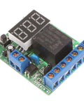 Voltage Relay Module With Upper And Lower Limit Detection, On Off Control, Over Voltage Protection, Battery Charge And Discharge Timing, 0-99.9V Display, Works With DC 12V And 24V Systems For Auto, Marine, And Solar Projects. Compact PCB relay module with 3-digit display and screw terminals