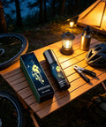 MNVKIJ Multipurpose Night Reflective Spray Agent High Visibility on wooden table with helmet, lantern, and bicycle.
