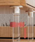 Adjustable Acrylic Furniture Legs 4 Piece Set With Screws, shown under wooden cabinet, illustrating height adjustment feature.