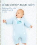 Baby in blue sleep suit designed for back sleeping in a crib with text 'Where comfort meets safety'