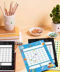 Science Reward Chart Must Have Bundle with colorful sheets and star stickers on a desk for classroom and home school use.