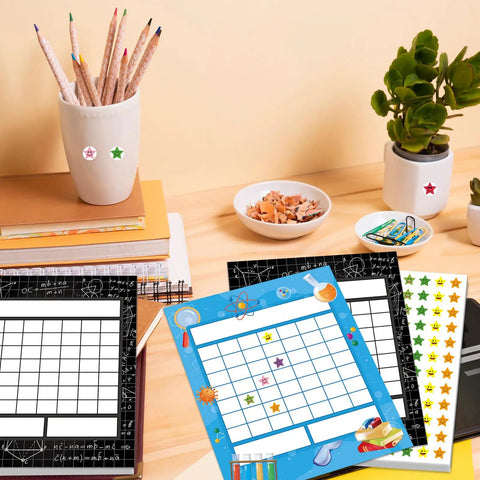 Science Reward Chart Must Have Bundle with colorful sheets and star stickers on a desk for classroom and home school use.