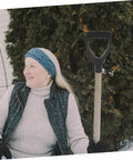 Woman holding Replacement Garden Shovel Handle With Plastic Grip Universal Spade Handle For Hand Shovels in winter garden