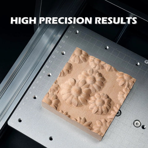Front view: Genmitsu 3020-PRO CNC router bed; wooden block carved with floral pattern.