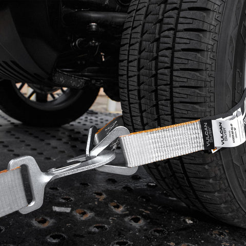 Complete Axle Strap Tie Down Kit With Snap Hook Ratchet Straps Silver Series webbing securing tire on flatbed