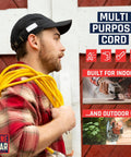 Man holding a yellow 10 Gauge Heavy Duty Lighted Plug Outdoor Extension Cord 25 Ft for indoor and outdoor use.