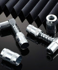 4 Piece 90 Degree Grease Gun Coupler Set with 3 Jaw Angle Fittings and Sleeves Spring Loaded Quick Connect Adapters on dark surface