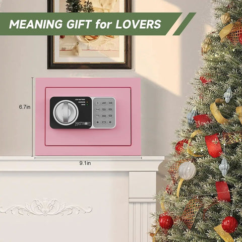 Pink Mini Safe Box With Code And Keys, 0.236 Cubic Feet, displayed on a mantel beside a decorated Christmas tree.