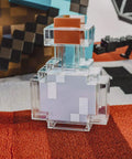 Potion Bottle Color Changing LED Desk Lamp With Pixelated Design in a gaming setup, showcasing its authentic pixel art decor.