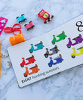 Totally Rad Toddler Counting Book Featuring Ten Noisy Rickshaws And Hella Fun Indian Culture Educational Picture Book For Little Ones Ages One To Three Early Learning Math Number Skills with colorful scooters and educational materials.