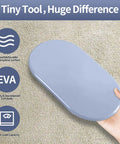 No Sweat Heavy Duty Furniture Movers Sliders 8 Pack For Carpet And Hardwood Floors oval slider in hand, 9.5x5.75 inch EVA material.