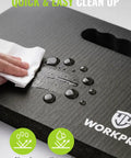 Person cleaning a Heavy Duty Kneeling Pad 2 Pack Extra Thick High Density Foam Floor Cushion Waterproof Black Mat.