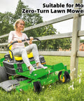 Woman mowing lawn on a zero-turn mower with a 2 Pack Flat Free Tire And Wheel Set For Lawn Mower, 13x5.00-6 Front Tires