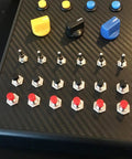 Control panel with various switches and knobs, featuring Mini Momentary Push Button Switch 1A 250VAC SPST NO Black Pre Wired 2 Pin Compact.