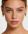 Chunky Gold Plated Earrings for Women, 18K Gold Plated Stainless Steel V Shape Heart Shell Studs on model