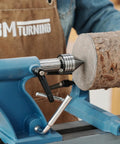Heavy Duty MT2 Live Tailstock Center For Wood Lathe With 60 Degree Ball Bearing Tip securing log for stable woodturning.