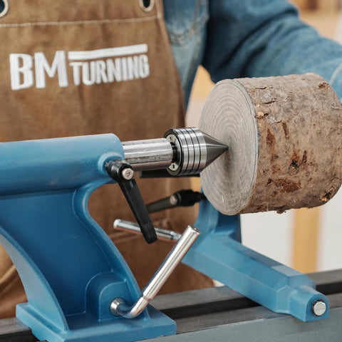 Heavy Duty MT2 Live Tailstock Center For Wood Lathe With 60 Degree Ball Bearing Tip securing log for stable woodturning.