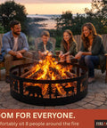 Family enjoying campfire with 36 Inch Heavy Duty Wood Burning Fire Pit Ring With Decorative Wildlife Design in the backyard at sunset.