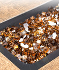 Copper Reflective Fire Glass 10 Lbs for propane fire pit shown in a close-up view, showcasing sparkly copper fire glass rocks.