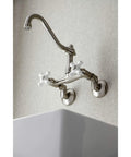Old School Vintage Style Wall Mount Kitchen Faucet In Brushed Nickel, Swivel Victorian Spout, 11.75 Inch Reach installed above sink