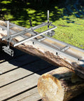 Portable Chainsaw Mill And Rail Guide System For Lumber Milling 14 To 36 Inch Bar With Nine Foot Aluminum Rail on log