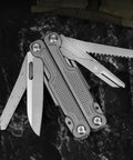 15 In 1 Multitool Pliers With Spring Loaded Head And Thick Hardened Steel Build Non Slip Handle on black surface
