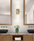 9-Inch Gold Modern Minimalist Integrated LED Vanity Light Sconce Dope Glow Dimmable Metal Wall Lamp for Bathroom Mirror Living Room Hallway Hardwired ETL Listed, showcased above double sink vanity with mirrors.