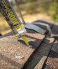Application of All Weather Clear Roof Sealant 10.5 Oz Cartridge on shingles to seal roof leaks.