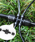 Six-Way Barbed Tee Connectors For Drip Irrigation, 1/2 Inch To 1/4 Inch Tee Splitters in garden setup.