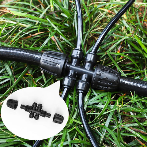 Six-Way Barbed Tee Connectors For Drip Irrigation, 1/2 Inch To 1/4 Inch Tee Splitters in garden setup.