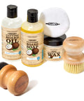 Cutting Board Care Kit With Coconut Oil And Wax For Wood Surfaces Kitchen Countertops Butcher Blocks And Utensils Includes Oil Wax Applicator And Buffing Pad Food Safe And Easy To Maintain A Real Game Changer For Home Chefs showing bottles of oil, soap, wax, with applicator and brush.