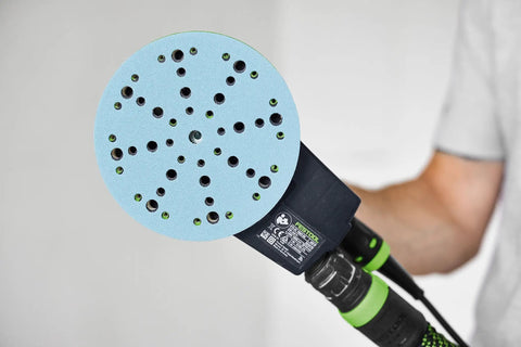 Close-up of 120 Grit Granat Sanding Discs on 6 Inch Sander, Stick Fix design shown in action, Germany Made High Performance Abrasives