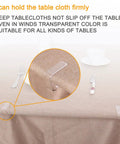Image showing 24 Pack Transparent Tablecloth Clips, Windproof Plastic Table Cover Clamps securing a beige tablecloth on a table.